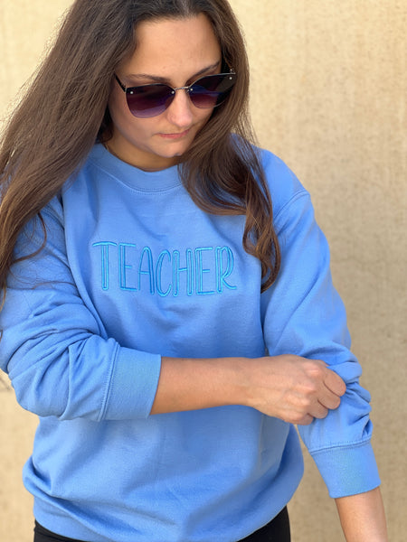Teacher. Blue Gildan Sweatshirt. Embroidered in Blue. - touchofsouth
