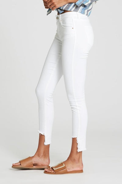 Comfortable mid rise white jeans with a designed ripe alone the bottom