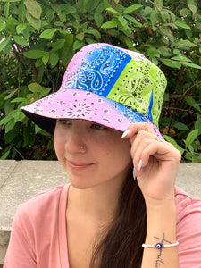 bandana pattern bucket hat that has pink, blue, and green